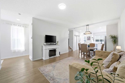 17 Precedence Glen, Cochrane, AB - Indoor Photo Showing Living Room