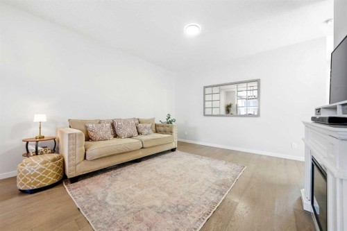 17 Precedence Glen, Cochrane, AB - Indoor Photo Showing Living Room
