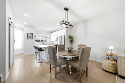 17 Precedence Glen, Cochrane, AB - Indoor Photo Showing Dining Room