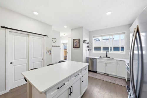 17 Precedence Glen, Cochrane, AB - Indoor Photo Showing Kitchen