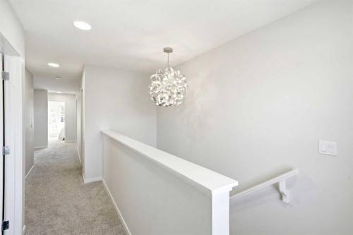 17 Precedence Glen, Cochrane, AB - Indoor Photo Showing Other Room
