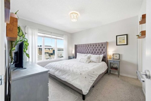 17 Precedence Glen, Cochrane, AB - Indoor Photo Showing Bedroom