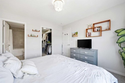 17 Precedence Glen, Cochrane, AB - Indoor Photo Showing Bedroom