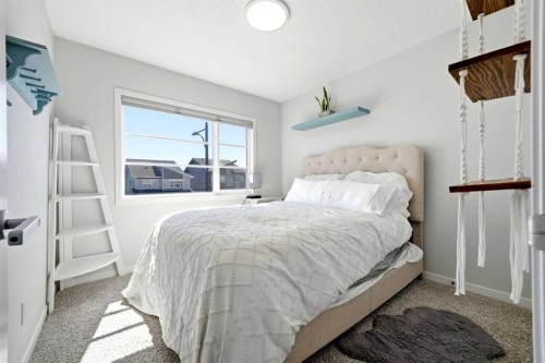17 Precedence Glen, Cochrane, AB - Indoor Photo Showing Bedroom