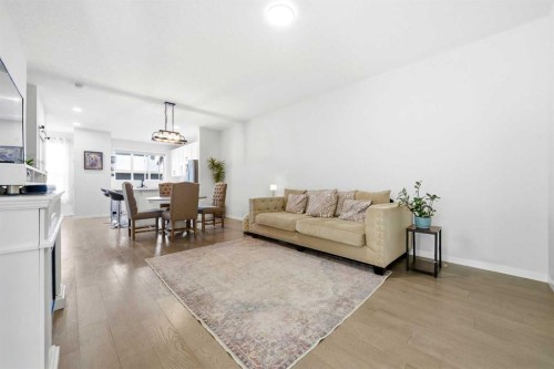 17 Precedence Glen, Cochrane, AB - Indoor Photo Showing Living Room