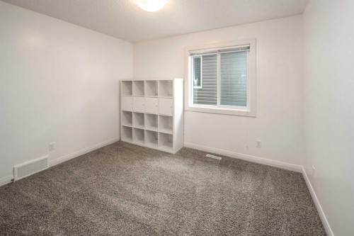 238 Silverado Plains Circle Sw, Calgary, AB - Indoor Photo Showing Other Room
