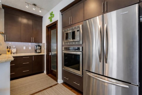 238 Silverado Plains Circle Sw, Calgary, AB - Indoor Photo Showing Kitchen With Stainless Steel Kitchen With Upgraded Kitchen