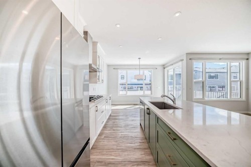 16 West Grove Link Sw, Calgary, AB - Indoor Photo Showing Kitchen With Upgraded Kitchen