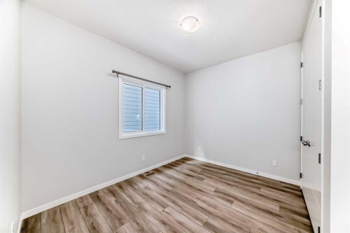 16 West Grove Link Sw, Calgary, AB - Indoor Photo Showing Other Room