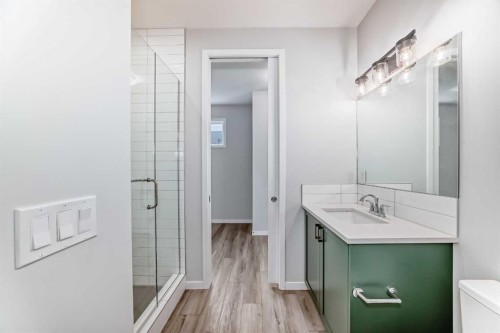 16 West Grove Link Sw, Calgary, AB - Indoor Photo Showing Bathroom