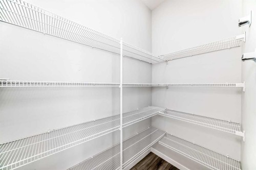 16 West Grove Link Sw, Calgary, AB - Indoor With Storage