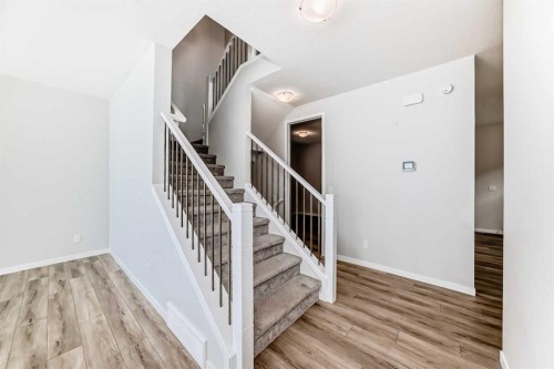 16 West Grove Link Sw, Calgary, AB - Indoor Photo Showing Other Room