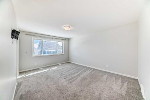 16 West Grove Link Sw, Calgary, AB - Indoor Photo Showing Other Room