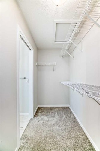 16 West Grove Link Sw, Calgary, AB - Indoor With Storage