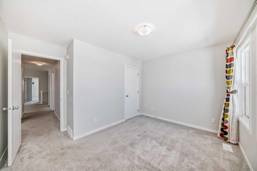 16 West Grove Link Sw, Calgary, AB - Indoor Photo Showing Other Room