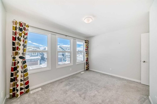 16 West Grove Link Sw, Calgary, AB - Indoor Photo Showing Other Room