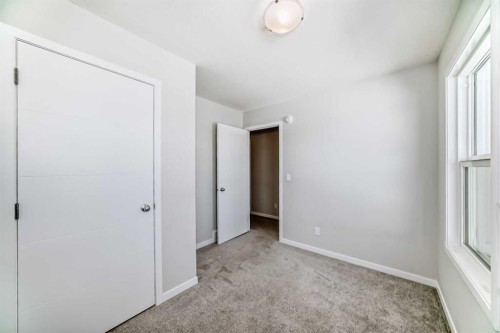 16 West Grove Link Sw, Calgary, AB - Indoor Photo Showing Other Room