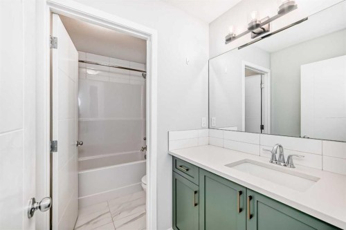 16 West Grove Link Sw, Calgary, AB - Indoor Photo Showing Bathroom