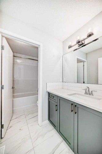 16 West Grove Link Sw, Calgary, AB - Indoor Photo Showing Bathroom