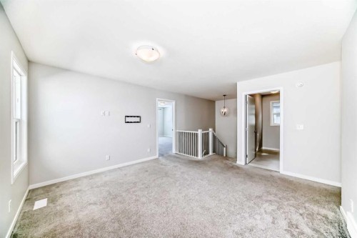 16 West Grove Link Sw, Calgary, AB - Indoor Photo Showing Other Room