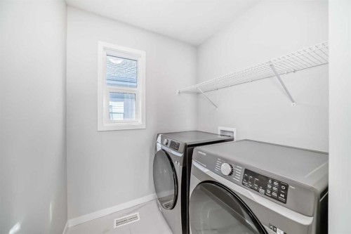 16 West Grove Link Sw, Calgary, AB - Indoor Photo Showing Laundry Room