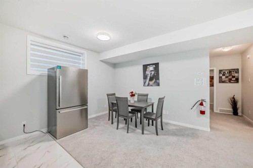 16 West Grove Link Sw, Calgary, AB - Indoor Photo Showing Dining Room