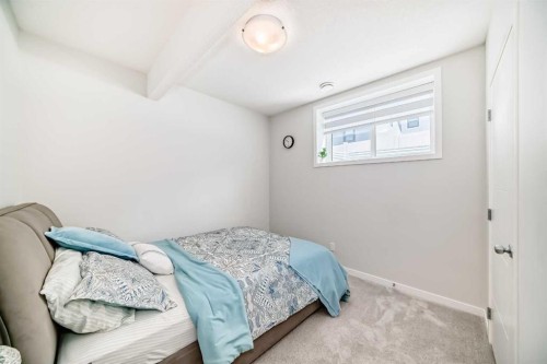 16 West Grove Link Sw, Calgary, AB - Indoor Photo Showing Bedroom