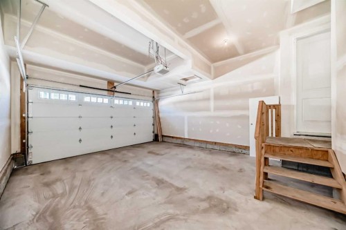 16 West Grove Link Sw, Calgary, AB - Indoor Photo Showing Garage