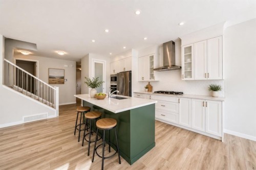 16 West Grove Link Sw, Calgary, AB - Indoor Photo Showing Kitchen With Upgraded Kitchen