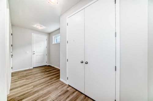 16 West Grove Link Sw, Calgary, AB - Indoor Photo Showing Other Room