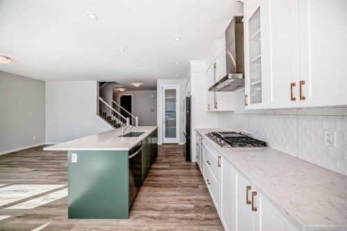 16 West Grove Link Sw, Calgary, AB - Indoor Photo Showing Kitchen With Upgraded Kitchen
