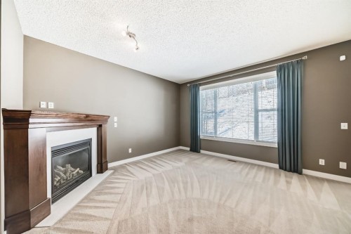 259 St Moritz Drive Sw, Calgary, AB - Indoor With Fireplace