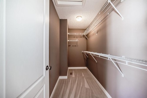 259 St Moritz Drive Sw, Calgary, AB - Indoor With Storage