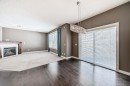 259 St Moritz Drive Sw, Calgary, AB  - Indoor With Fireplace 