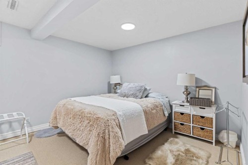 10311 Wapiti Drive Se, Calgary, AB - Indoor Photo Showing Bedroom