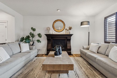 54 Auburn Glen Place Se, Calgary, AB - Indoor Photo Showing Living Room With Fireplace