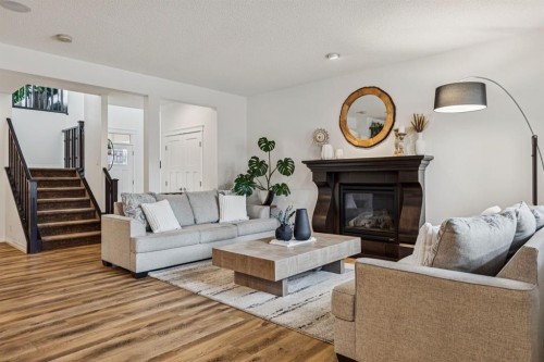 54 Auburn Glen Place Se, Calgary, AB - Indoor Photo Showing Living Room With Fireplace