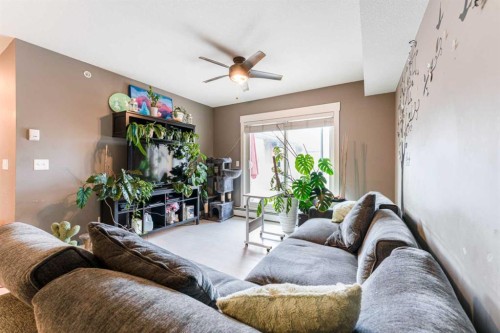 2410-240 Skyview Ranch Road Ne, Calgary, AB - Indoor Photo Showing Living Room