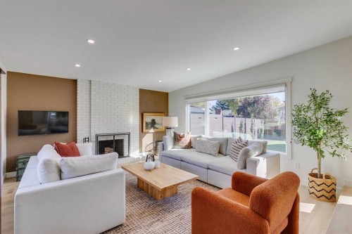 419 Parkview Crescent Se, Calgary, AB - Indoor Photo Showing Living Room With Fireplace