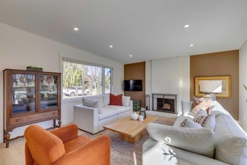 419 Parkview Crescent Se, Calgary, AB - Indoor Photo Showing Living Room With Fireplace