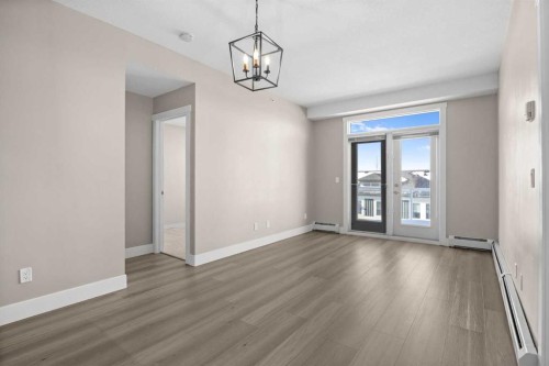 407-2300 Evanston Square Nw, Calgary, AB - Indoor Photo Showing Other Room
