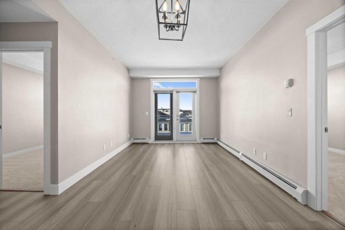 407-2300 Evanston Square Nw, Calgary, AB - Indoor Photo Showing Other Room