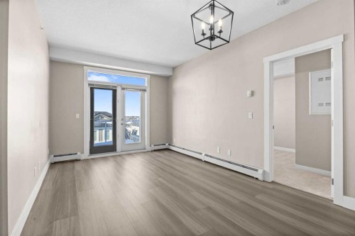407-2300 Evanston Square Nw, Calgary, AB - Indoor Photo Showing Other Room