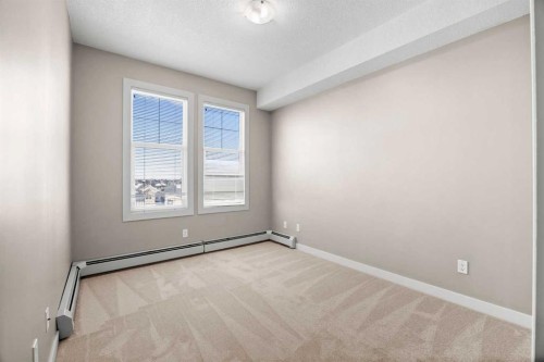 407-2300 Evanston Square Nw, Calgary, AB - Indoor Photo Showing Other Room