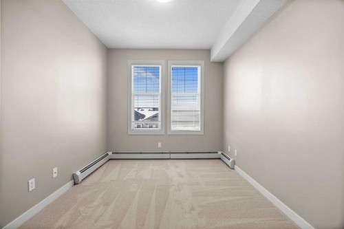 407-2300 Evanston Square Nw, Calgary, AB - Indoor Photo Showing Other Room