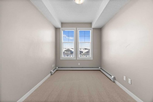 407-2300 Evanston Square Nw, Calgary, AB - Indoor Photo Showing Other Room