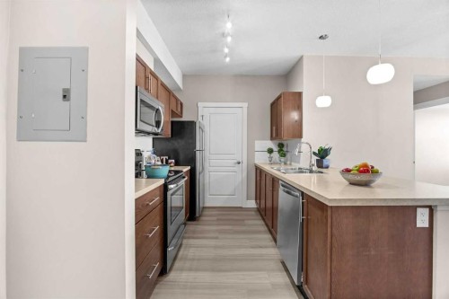 407-2300 Evanston Square Nw, Calgary, AB - Indoor Photo Showing Kitchen