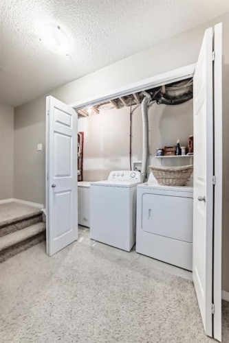 111 Ranch Ridge Meadow, Strathmore, AB - Indoor Photo Showing Laundry Room