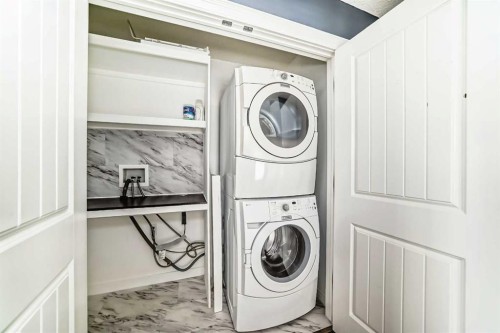 65 Morningside Circle Sw, Airdrie, AB - Indoor Photo Showing Laundry Room