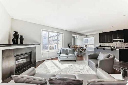 65 Morningside Circle Sw, Airdrie, AB - Indoor Photo Showing Living Room With Fireplace